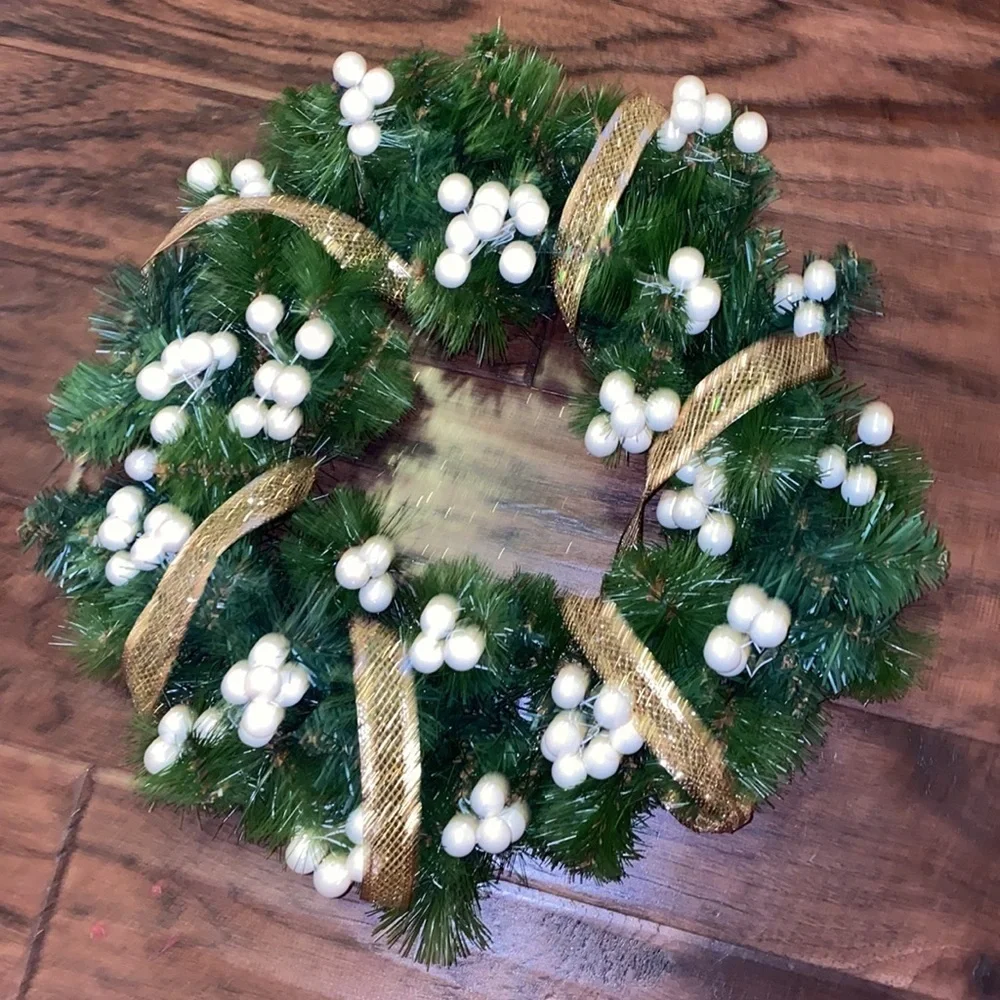 Green Holiday Wreath 15” across 10” wreath base includes gold ribbon pearl balls